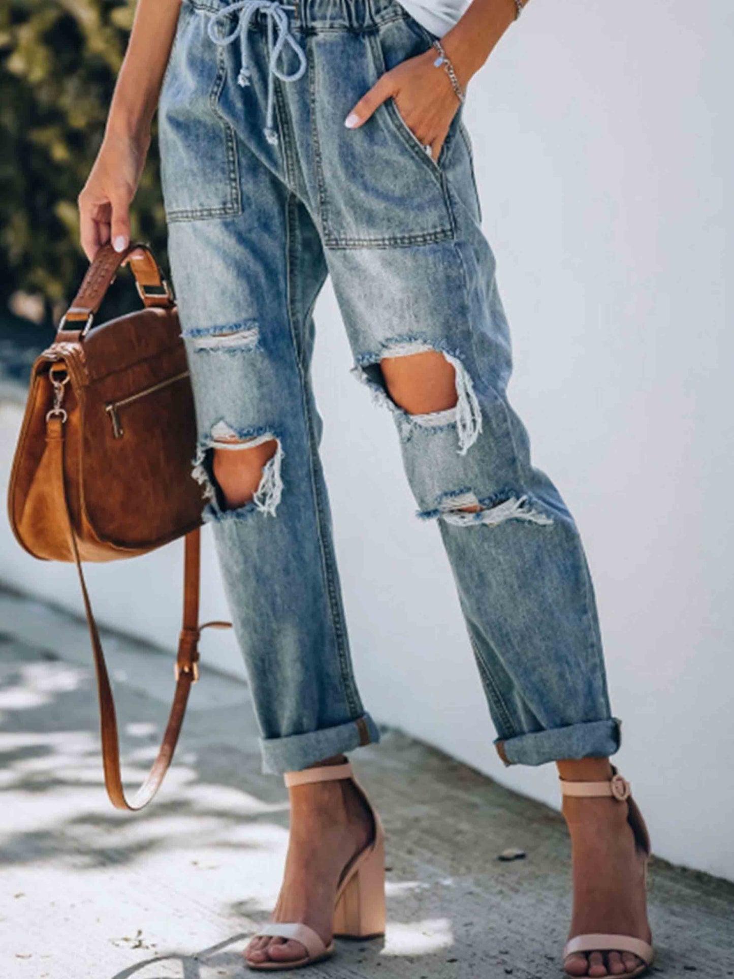 Amsoin ripped Lace-Up Jeans