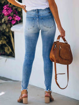 Amsoin Stretch Denim Ripped Jeans